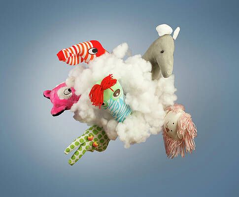Wall Art - Photograph - Toy Figure In Cloud by Paul Taylor