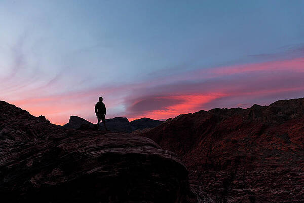 Wall Art - Photograph - Tranquil Scene Man Standing On Rock by Alexandra Simone