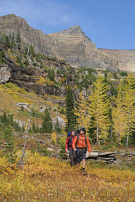 Wall Art - Photograph - Two Backpackers Make There Way To Camp by Heath Korvola
