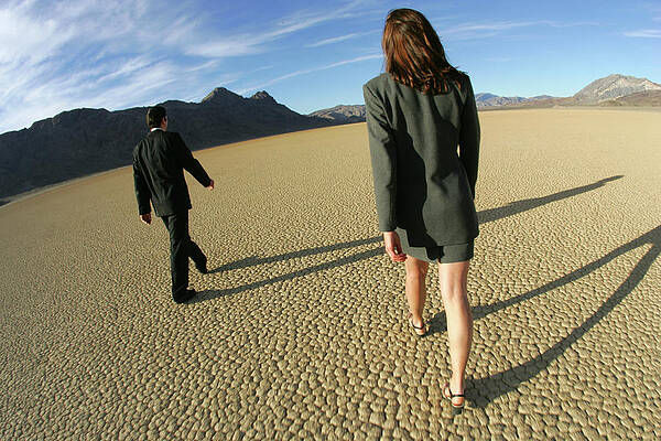 Wall Art - Photograph - Two Businessmen Walk On A Dried by Olivier Renck