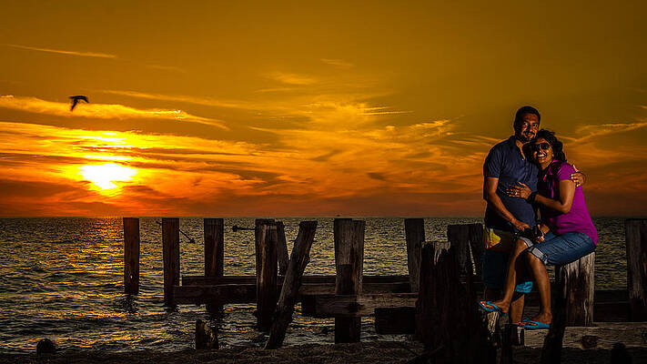 Wall Art - Photograph - Uma and Saurav at Sunset Beach by SAURAVphoto Online Store