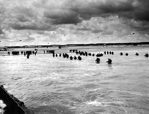 Wall Art - Photograph - U.s. Troops Wading To Utah Beach by Everett