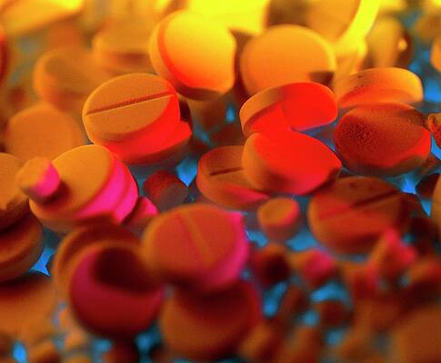 Wall Art - Photograph - View Of Several Aspirin And Homeopathy Pills by Chris Knapton/science Photo Library