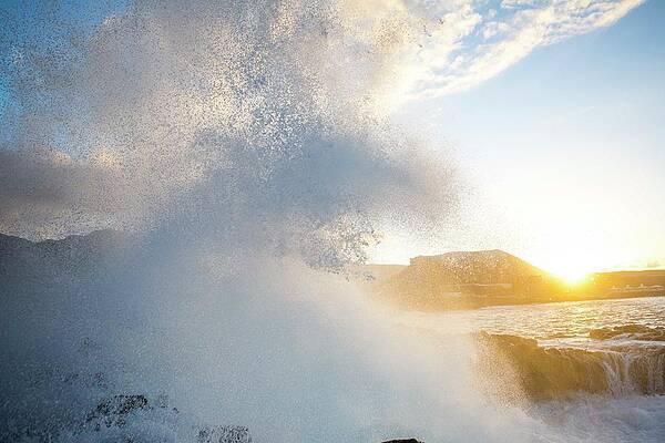Wall Art - Photograph - Wave Exploding On The Rocks At Sunset by Raffi Maghdessian