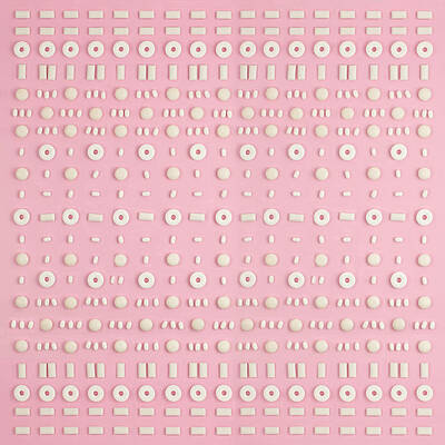 Wall Art - Photograph - White Candies Arranged In A Pattern by Juj Winn