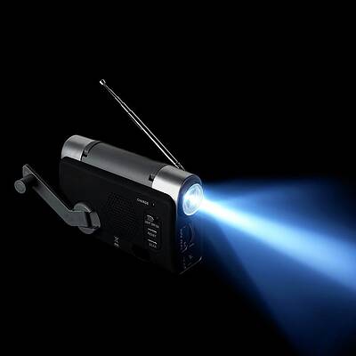 Wall Art - Photograph - Wind-up Radio And Torch by Science Photo Library