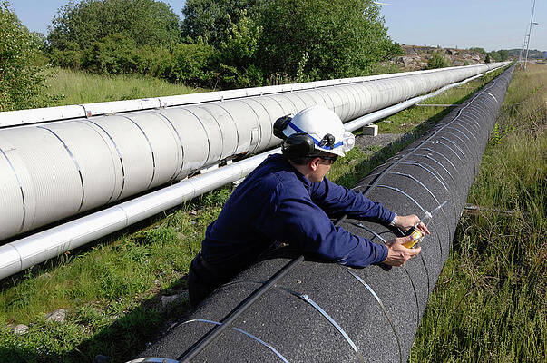 Wall Art - Photograph - Worker Checking Gas Pipeline by Science Photo Library