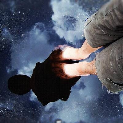 Wall Art - Photograph - Reflection of boy in a puddle of water #1 by Matthias Hauser