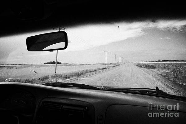 Wall Art - Photograph - driving car with cracked windshield on dirt road Saskatoon Saskatchewan Canada by Joe Fox