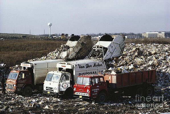 Wall Art - Photograph - Dumping Garbage In Landfill by Roger A. Clark
