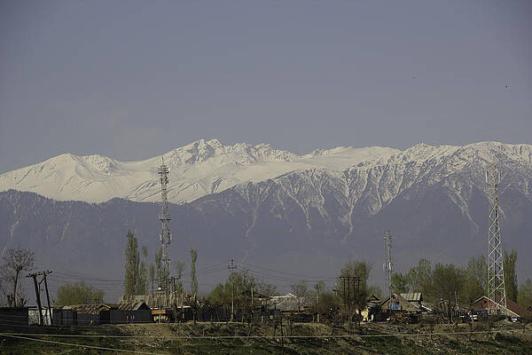 Ice capped mountains as visible in Srinagar by Ashish Agarwal Ice capped mountains as visible in Srinagar by Ashish Agarwal