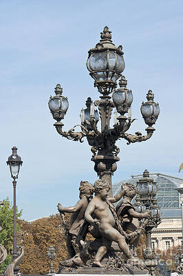 Wall Art - Photograph - Lamppost and statues on the bridge Alexandre III in Paris by Fabrizio Ruggeri