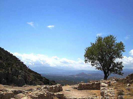 Wall Art - Photograph - Lovely Tree and Mountain Range Valley View from the Ancient Hilltop in Mycenae Greece by John Shiron