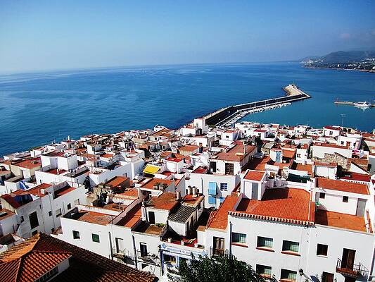 Wall Art - Photograph - Peniscola Ocean View Homes By The Marina Harbor Break Water in Spain by John Shiron