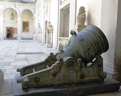 Wall Art - Photograph - Segovia Castle Architecture and Arches Row of Stands and Sculptures Artillery Academy Yard in Spain by John Shiron