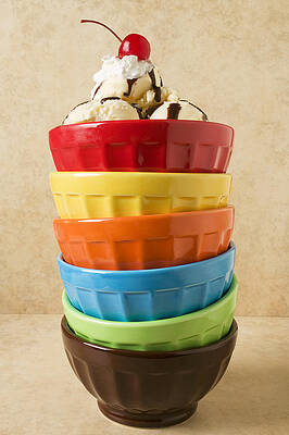 Wall Art - Photograph - Stack of colored bowls with ice cream on top by Garry Gay
