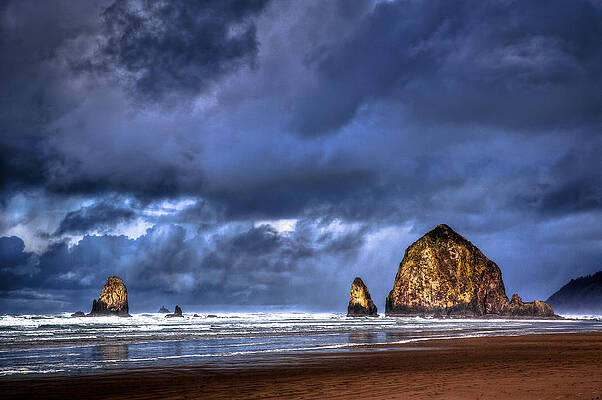 Wall Art - Photograph - Stormy Clouds in Cannon Beach by Niels Nielsen