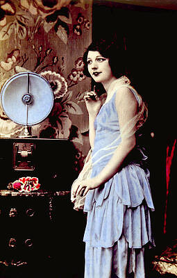 Wall Art - Photograph - Woman Listening To A Radio, C. 1920s by Everett