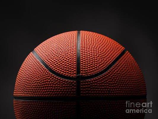 Basketball on dark background by Andreas Berheide Basketball on dark background by Andreas Berheide