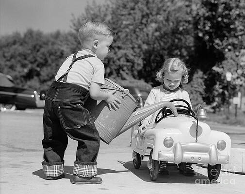 Wall Art - Photograph - Boy Playing Gas Station Attendant by H. Armstrong Roberts/ClassicStock
