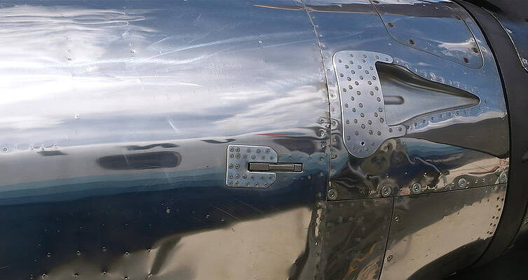 Wall Art - Photograph - Fuselage Reflection by Michele Myers