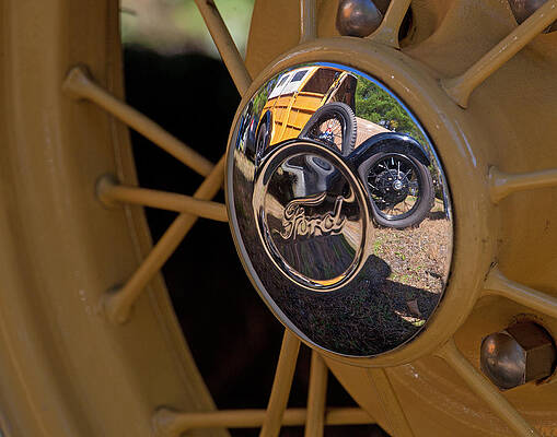 Hubcap Reflection by Mike  Tracy