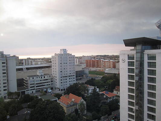 Wall Art - Photograph - Lisbon Overcast Sunset Portugal by John Shiron