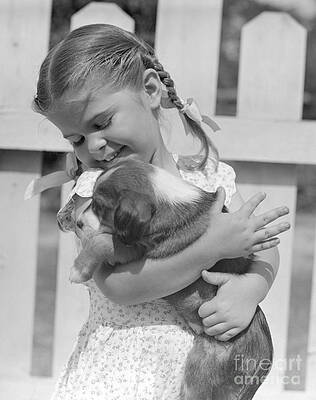 Wall Art - Photograph - Little Girl With Puppy, C. 1930s-50s by Pound/ClassicStock