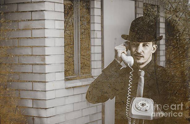 Old telephone on yellow background. Vintage phone with taken off receiver  by Michael Dechev