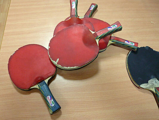 Number of ping pong bats piled on a table by Ashish Agarwal Number of ping pong bats piled on a table by Ashish Agarwal