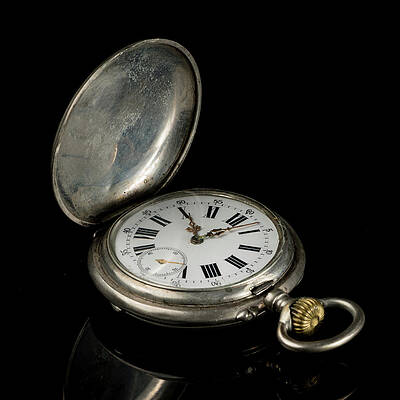  Photograph - Old pocket watch on a black reflective surface, open lid by Stefan Rotter