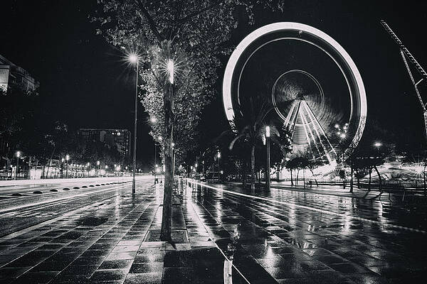 Wet Ferrris wheel in Barcelona by Torsten Funke Wet Ferrris wheel in Barcelona by Torsten Funke