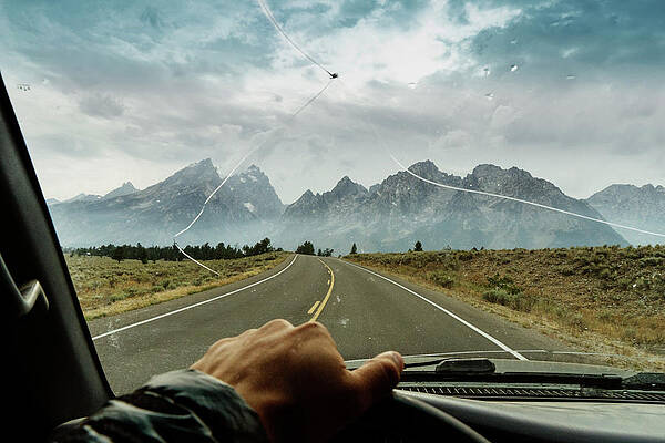 Wall Art - Photograph - Cropped Hand Of Man Driving Truck by Cavan Images