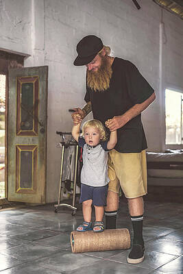 https://render.fineartamerica.com/images/images-profile-flow/400/images/artworkimages/mediumlarge/2/1-father-with-little-boy-pling-in-gym-cavan-images.jpg