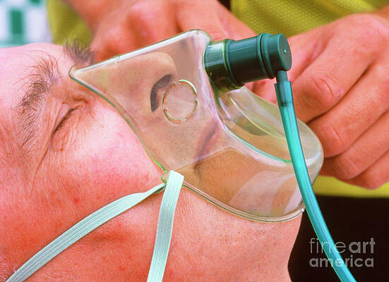 Wall Art - Photograph - Patient Being Given Oxygen By Ambulanceman #1 by Science Photo Library