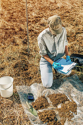 Wall Art - Photograph - Soil Scientist Taking Notes #1 by Science Photo Library