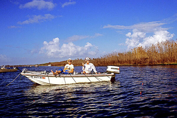 Wall Art - Painting - 1990s Couple In Boat Fishing Kissimmee by Vintage Images