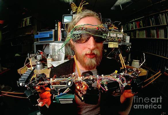 Wall Art - Photograph - Mit Scientist With Robot Insect 'genghis' #2 by Science Photo Library