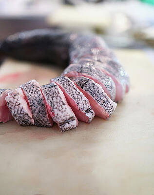 Wall Art - Photograph - Raw Fish Caught In The Hand Of The Fisherman #2 by Cavan Images