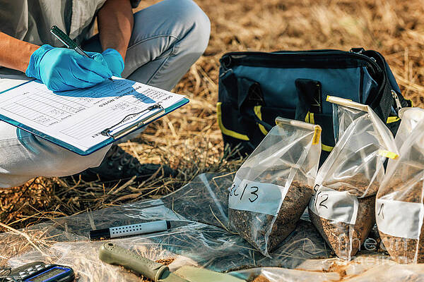 Wall Art - Photograph - Soil Scientist Taking Notes #3 by Science Photo Library