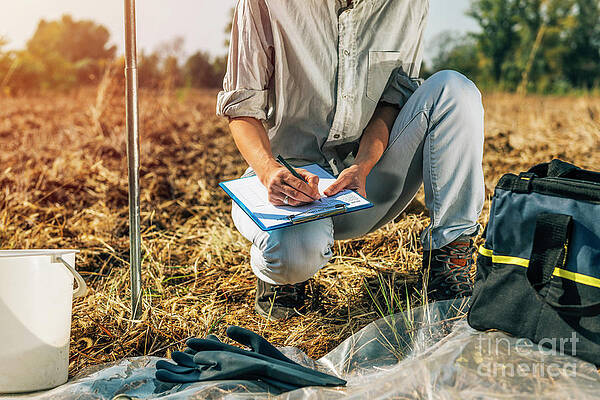 Wall Art - Photograph - Soil Scientist Taking Notes #5 by Science Photo Library