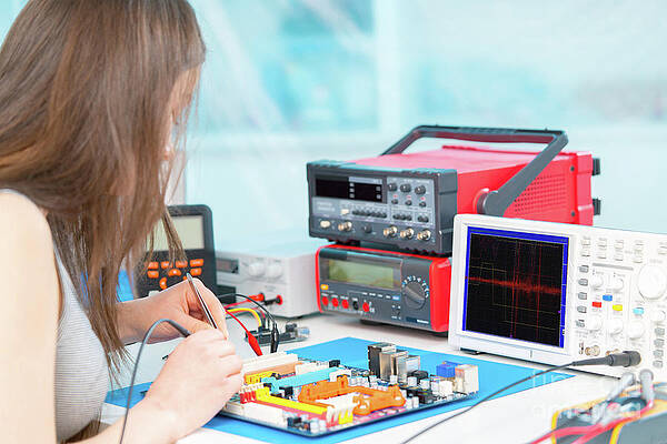 Wall Art - Photograph - Girl Working On Electronics Project #6 by Science Photo Library