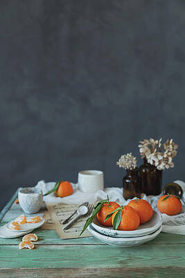 Wall Art - Photograph - A Fresh Breakfast With Clementines On A Green Wood Table by Cavan Images