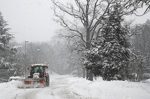 Wall Art - Photograph - A Tractor Removes Snow at the European by Denis Balibouse