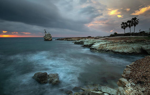 Wall Art - Photograph - Abandoned ship of EDRO III resting on the coastline of Peyia in  by Michalakis Ppalis