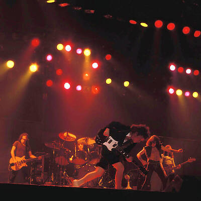 Wall Art - Photograph - Ac/dc In Concert by Michael Nischk