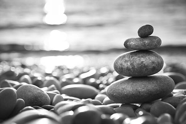 balanced-stones-on-a-beach-black-and-spooh.jpg