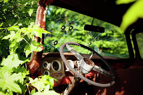 Wall Art - Photograph - Bullet Holes On Pick-up Truck Windshield by Cavan Images