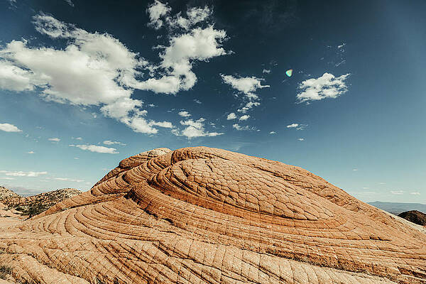 Wall Art - Photograph - Circular Patterns Of Petrified Sand Dunes On Red Rock In Utah Desert by Cavan Images