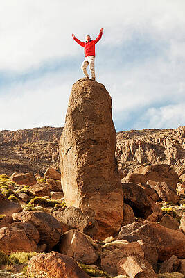 Wall Art - Photograph - Climber On An Exposed Pinnacle In The Jebel Sirwa Region Of by Ashley Cooper / Naturepl.com